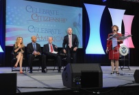 NEW YORK, NY - OCTOBER 18: (L-R) Singer Thalia, Former Yankee Mariano Rivera, Director of the U.S. Citizenship and Immigration Services Leon Rodriguez, and Deputy Secretary of Homeland Security Alejandro Mayorkas speak onstage during the Naturalization Ceremony at Festival PEOPLE En Espanol 2015 presented by Verizon at Jacob Javitz Center on October 18, 2015 in New York City. (Photo by Brad Barket/Getty Images for PEOPLE En Espanol)